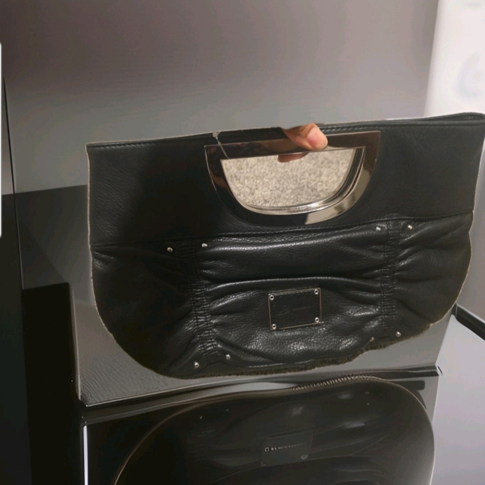 Beautiful Pre-loved B.May clutch bag with Silver Handle magnetic Closure.